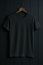 Black t-shirt on a wooden hanger against a dark wooden panel background