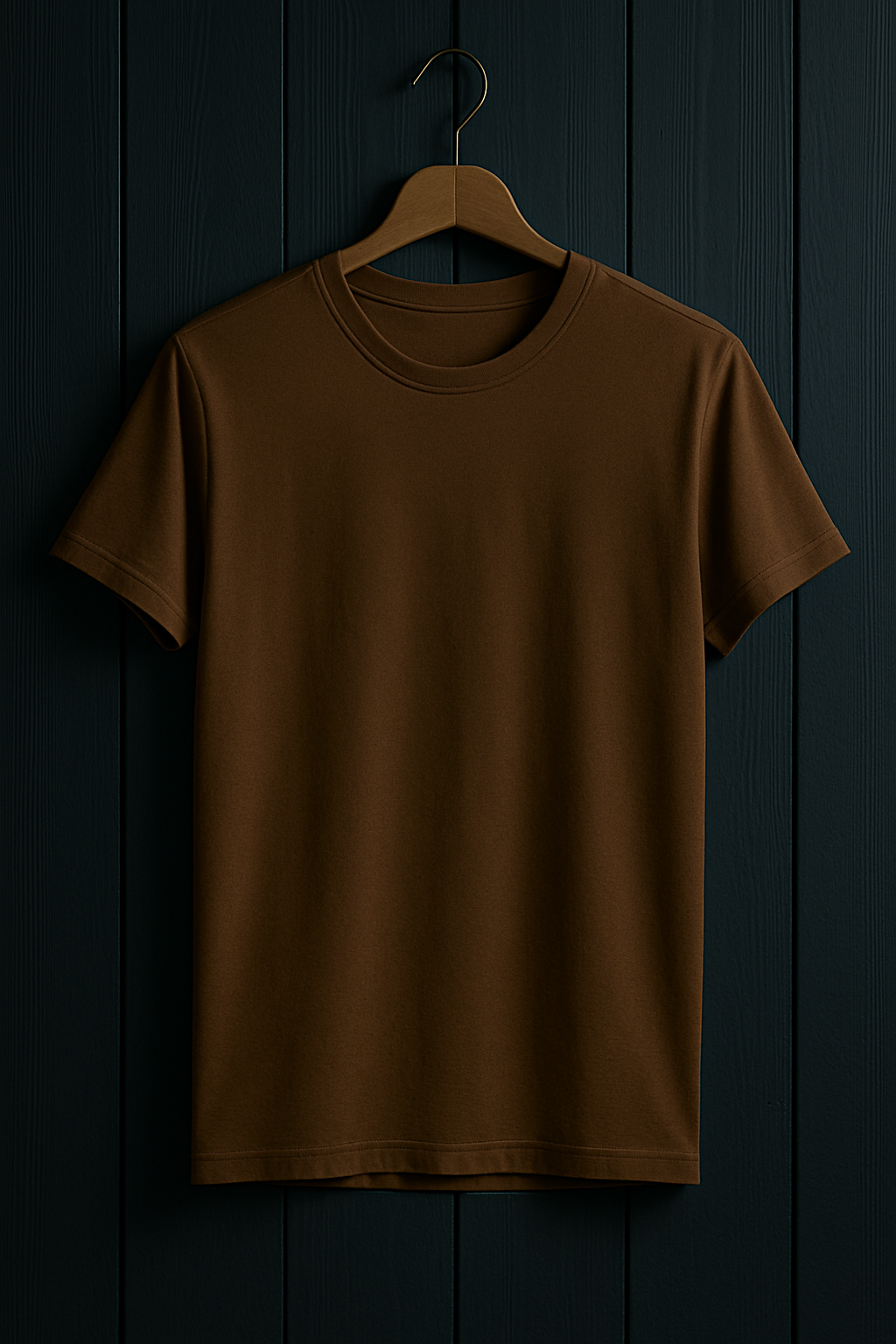Brown t-shirt on a wooden hanger against a dark wooden panel background